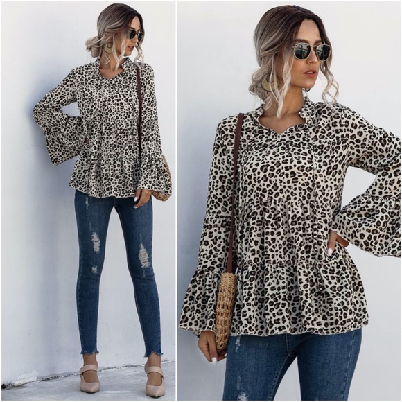 Tops - Leopard Print Peplum style long sleeve blouse